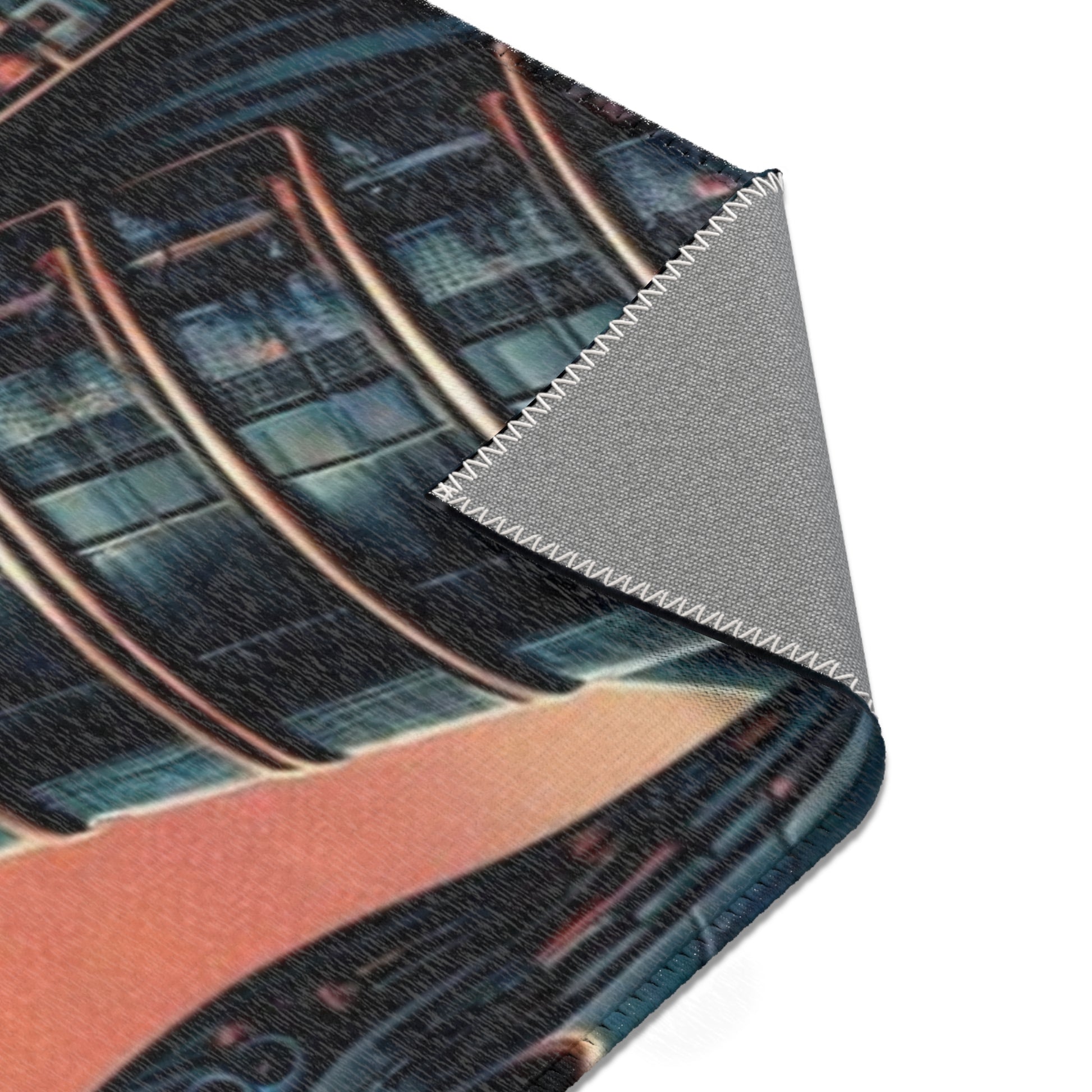 Close-up of a fabric swatch with a patterned design on a white background