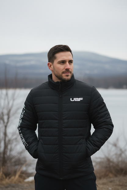 Black puffer jacket with white text on sleeves and logo on chest against a white background