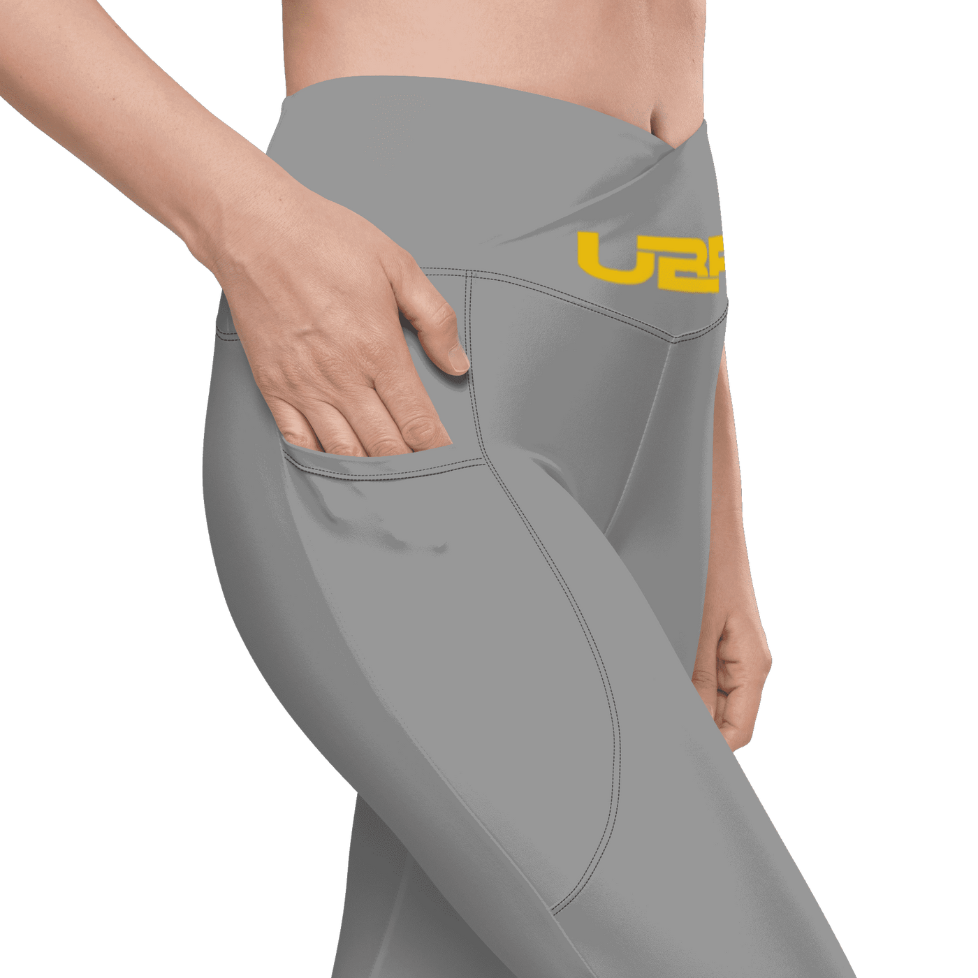 Gray and gold Crossover leggings with pockets.